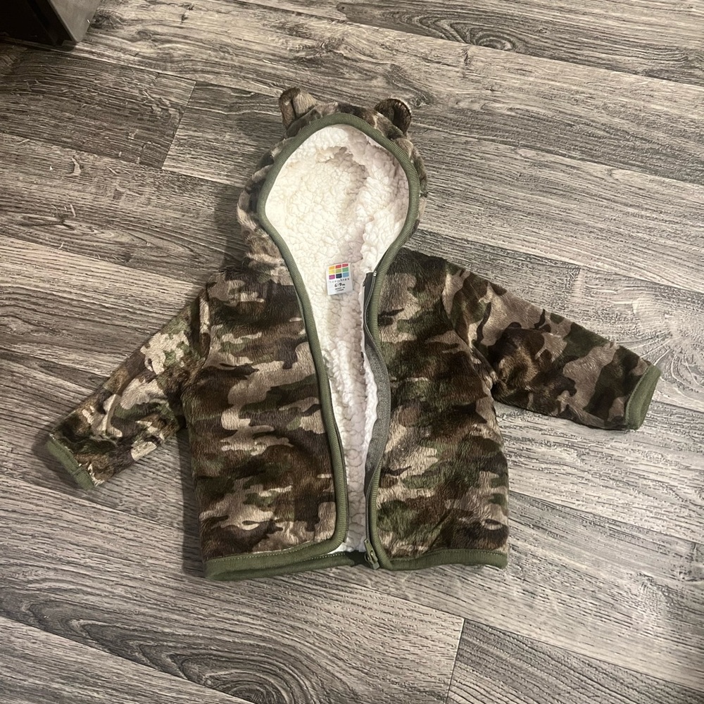 Camouflage bear coat